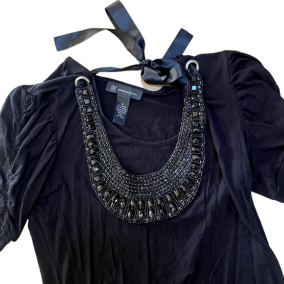 INC - Picture 2 of 2